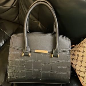 Black purse gold accent like new